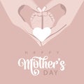 Mother\'s day mother\'s hands hold the legs of the child she loves in beige colors