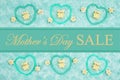 Mother`s Day Sale message with teal frame hearts, teddy bears and rose buds on a teal plush fabric