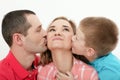 Mother`s Day. Son kissing and hugging her mother. Husband kisses Royalty Free Stock Photo