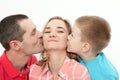 Mother`s Day. Son kissing and hugging her mother. Husband kisses Royalty Free Stock Photo