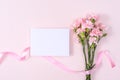 Mother`s Day, Valentine`s Day background design concept, beautiful pink carnation flower bouquet on pastel pink table, top view, Royalty Free Stock Photo