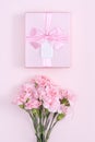 Mother`s Day, Valentine`s Day background design concept, beautiful pink carnation flower bouquet on pastel pink table, top view, Royalty Free Stock Photo