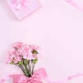 Mother`s Day, Valentine`s Day background design concept, beautiful pink carnation flower bouquet on pastel pink table, top view, Royalty Free Stock Photo