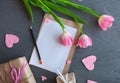 Mother`s Day, woman`s day. tulips ,presents and letter on wooden background Royalty Free Stock Photo