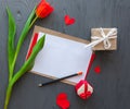 Mother`s Day, woman`s day. tulips ,presents and letter on wooden background Royalty Free Stock Photo