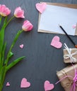 Mother`s Day, woman`s day. tulips ,presents and letter on wooden background Royalty Free Stock Photo