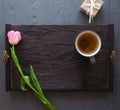 Mother`s Day, woman`s day. tulips ,presents ,tea and sweets on wooden background Royalty Free Stock Photo