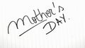 Mother`s day writing love text for mother on paper. Label tag with lovely message for mother`s day