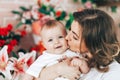 Mother`s day. Young beautiful mother hugging with her little baby Royalty Free Stock Photo