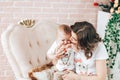 Mother`s day. Young beautiful mother hugging with her little baby Royalty Free Stock Photo