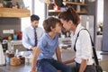 Mother Saying Goodbye To Son As She Leaves For Work Royalty Free Stock Photo