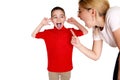 Mother scolding a disobedient son. Royalty Free Stock Photo