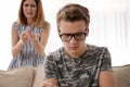 Mother scolding her teenager son Royalty Free Stock Photo