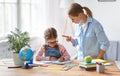 Mother scolds a child for poor schooling and homework Royalty Free Stock Photo