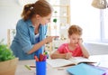 Mother scolds a child for poor schooling  and homework Royalty Free Stock Photo