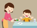 Mother serving food to son Royalty Free Stock Photo