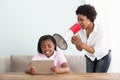 Mother Shouts At Her Daughter In A Megaphone Royalty Free Stock Photo