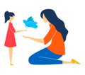 Mother showing a bird to her daughter. Adult woman and young girl with a blue bird, caring and learning. Motherly love Royalty Free Stock Photo