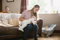 Mother Burping Her Baby Boy Royalty Free Stock Photo