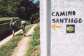 Mother and son as a pilgrims walk on St.Santiago Way, North Spain