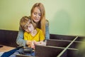 Mother and son assembling furniture. Boy helping his mom at home. Happy Family concept Royalty Free Stock Photo