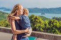 Mother and son in the background of Tropical beach landscape pan Royalty Free Stock Photo