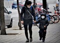 Mother and Son Beijing Pollution masks Royalty Free Stock Photo