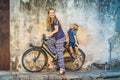 Mother and son on a bicycle. Public street bicycle in Georgetown, Penang, Malaysia Royalty Free Stock Photo