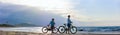 Mother and son biking at beach Royalty Free Stock Photo