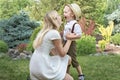 Life moment of happy family! Mother and son child playing having fun together on the grass in sunny summer day Royalty Free Stock Photo