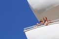 Mother with son and daughter standing on the balcony Royalty Free Stock Photo