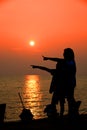 Mother and son in a deep moment of love during sunset at beach Royalty Free Stock Photo