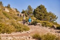 Mother and son descending a mountain path Royalty Free Stock Photo