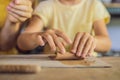 Mother and son doing ceramic pot in pottery workshop Royalty Free Stock Photo