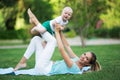 Mother and son doing exercise outdoors. Healthy lifestyle. Yoga Royalty Free Stock Photo