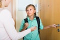 Mother with son at doorway Royalty Free Stock Photo