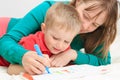 Mother and son drawing family Royalty Free Stock Photo