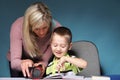 Mother and son drawing together Royalty Free Stock Photo