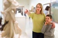 Mother and son enjoying expositions in museum Royalty Free Stock Photo