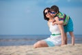 Mother and son enjoying time at tropical beach Royalty Free Stock Photo