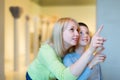 Mother and son exploring old bas-reliefs Royalty Free Stock Photo