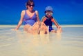 Mother and son feet on summer beach Royalty Free Stock Photo