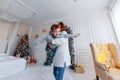 Mother and son in front of the christmas tree New year`s eve. love, happiness and big family concept Royalty Free Stock Photo