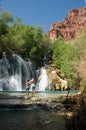 Mother and Son in front of Navajo Falls in Havasu, Arizona Royalty Free Stock Photo