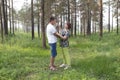 Mother and son had a dancing in a summer forest Royalty Free Stock Photo