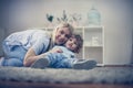 Mother and son have enjoy together in their living room.