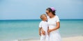 Mother and son having fun on the beach Royalty Free Stock Photo