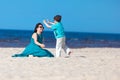 Mother and son having fun beach vacation Royalty Free Stock Photo