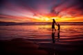 Mother and son having fun at sunset on the beach Royalty Free Stock Photo