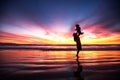 Mother and son having fun at sunset on the beach Royalty Free Stock Photo